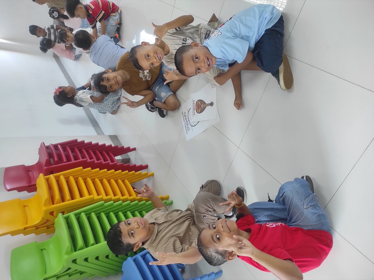 Students doing group activity with traditional instruments worksheet